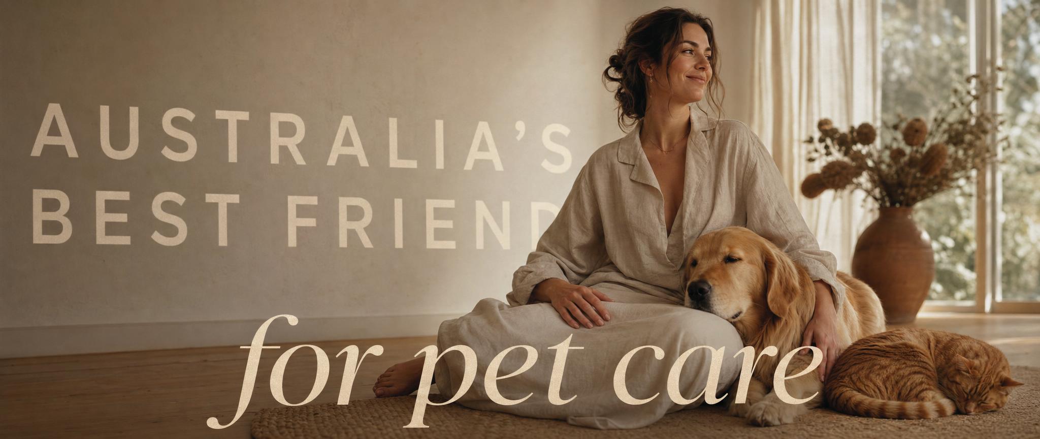 A woman relaxing at home with her golden retriever and ginger cat
